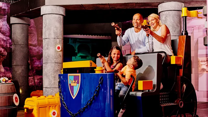 kids and parents on lego ride